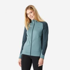Polar turystyczny damski Quechua MH520 Light. Niebieskie bluzy z polaru QUECHUA, m, bez wzorów, z elastanu, trekkingowe. Za 159.99 zł.
