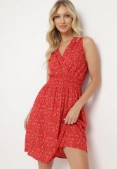 Czerwona Wiskozowa Sukienka w Kwiaty z Gumką w Talii i Kopertowym Dekoltem Halevia. Czerwone sukienki Born2be, na imprezę, m, bez wzorów, z materiału, eleganckie, bez kołnierzyka, bez ramiączek, midi, kopertowe. W wyprzedaży za 52.49 zł.