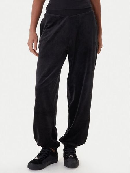 Juicy Couture Spodnie dresowe Davidson JCBBJ224811 Czarny Regular Fit. Czarne spodnie dresowe Juicy Couture, bez wzorów, z dresówki. Za 429.99 zł.