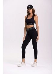 Onamaste Legginsy sportowe "Millie" w kolorze czarnym rozmiar: L/XL. Czarne legginsy Onamaste, bez wzorów, z materiału, sportowe. Za 158.10 zł.