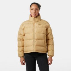 Damska kurtka puchowa Helly Hansen YU 23. Brązowe kurtki Helly Hansen, bez wzorów, z puchu, eleganckie, bez kaptura. W wyprzedaży za 682.50 zł.