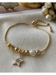 Luseera Pozłacana bransoletka z elementami ozdobnymi rozmiar: onesize. Żółte bransoletki Luseera, z cyrkonią, pozłacane. Za 39.99 zł.