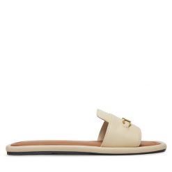 Klapki Tommy Hilfiger. Brązowe klapki Tommy Hilfiger, bez wzorów, bez obcasa, bez zapięcia. Za 479.99 zł.