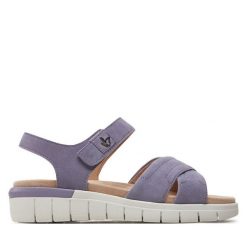 Sandały Caprice. Fioletowe sandały Caprice, bez wzorów, bez obcasa, na płaskiej podeszwie, bez zapięcia. Za 339.99 zł.