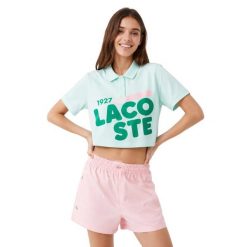 Koszulka sportowa damska Lacoste Loose Fit Printed. Zielone t-shirty sportowe Lacoste, xs, bez wzorów, z bawełny, bez ramiączek, na golfa. Za 357.00 zł.