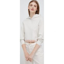 Calvin Klein Jeans bluza damska kolor beżowy z kapturem gładka. Brązowe bluzy Calvin Klein Jeans, l, bez wzorów, z jeansu, bez ramiączek, z kapturem. W wyprzedaży za 314.99 zł.