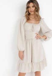 Beżowa Sukienka Auxede. Brązowe sukienki Born2be, na imprezę, bez wzorów, z tkaniny, bez kołnierzyka, bez ramiączek, mini, rozkloszowane. Za 119.99 zł.