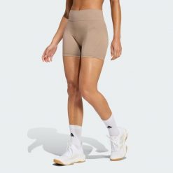 Legginsy Workout Essentials 4 inch. Brązowe legginsy adidas, bez wzorów, sportowe. Za 129.00 zł.