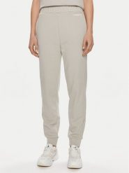 Calvin Klein Spodnie dresowe Micro Logo K20K206632 Beżowy Regular Fit. Brązowe spodnie dresowe Calvin Klein, bez wzorów, z bawełny. Za 289.99 zł.