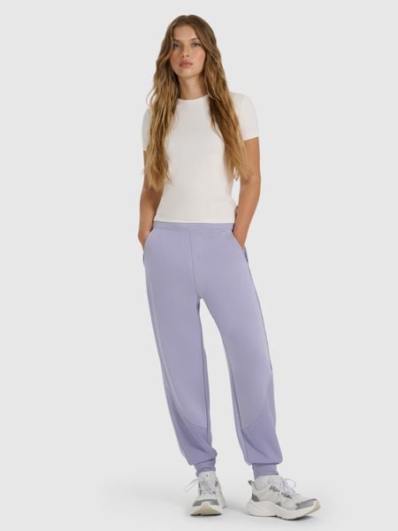 4F Spodnie dresowe joggery z modalem damskie - granatowe L. Niebieskie spodnie dresowe 4f, bez wzorów, z dresówki, sportowe. W wyprzedaży za 159.99 zł.