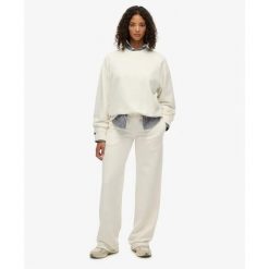 Bluza damska Superdry Studios. Białe bluzy Superdry, bez wzorów, bez ramiączek, bez kaptura. Za 288.40 zł.