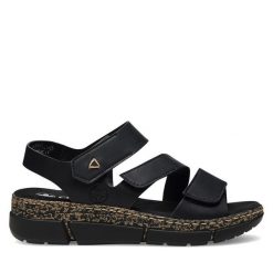 Sandały Rieker. Czarne sandały Rieker, bez wzorów, bez obcasa, na koturnie, bez zapięcia. Za 289.99 zł.