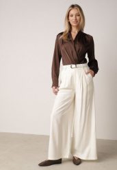 Białe Szerokie Spodnie Wiskozowe w Garniturowym Stylu z Paskiem Qera. Białe jeansy Born2be, l, bez wzorów, z jeansu, eleganckie. Za 129.99 zł.