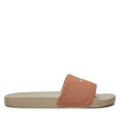 Klapki Calvin Klein Jeans. Czerwone klapki Calvin Klein Jeans, bez wzorów, z jeansu, bez obcasa, bez zapięcia. Za 179.99 zł.