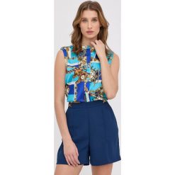 Marciano Guess koszula damska relaxed ze stójką. Niebieskie koszule Marciano Guess, s, z aplikacjami, z tkaniny, bez kołnierzyka, bez ramiączek. Za 539.99 zł.