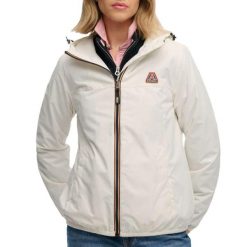 Damska wiatrówka Superdry Essential Tri. Białe kurtki przeciwdeszczowe Superdry, l, bez wzorów, z materiału, bez kaptura, trekkingowe. Za 428.40 zł.