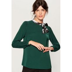 Koszula z wiązaniem na dekolcie - Khaki. Koszule marki QUECHUA. W wyprzedaży za 49.99 zł.
