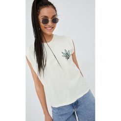 Volcom top bawełniany kolor beżowy. Brązowe topy Volcom, l, bez wzorów, z bawełny, bez kołnierzyka, bez ramiączek. Za 139.99 zł.