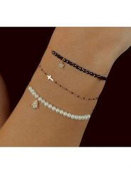 Les Petites Précieuses Pozłacana bransoletka z cyrkoniami rozmiar: onesize. Czarne bransoletki Les Petites Précieuses, z cyrkonią, pozłacane. Za 100.52 zł.