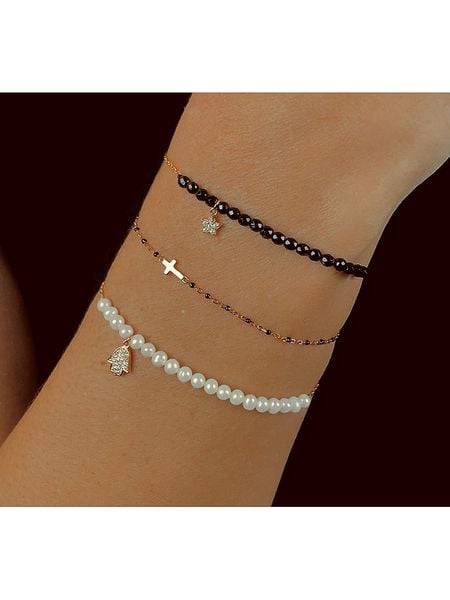 Les Petites Précieuses Pozłacana bransoletka z cyrkoniami rozmiar: onesize. Czarne bransoletki Les Petites Précieuses, z cyrkonią, pozłacane. Za 100.52 zł.