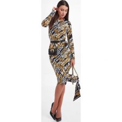 Sukienka VERSACE JEANS COUTURE. Białe sukienki Versace Jeans Couture, bez wzorów, z jeansu, bez kołnierzyka, bez ramiączek. W wyprzedaży za 951.30 zł.