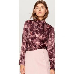 Bluzka w kwiaty retro - Wielobarwn. Bluzki marki DOMYOS. W wyprzedaży za 49.99 zł.