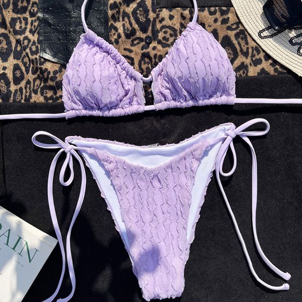 Bikini prążkowane na plażę regulowane ramiączka Ruveyda. Fioletowe bikini Intica, bez wzorów, z materiału, eleganckie. Za 139.00 zł.