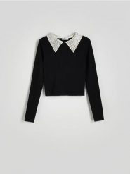 Sweter z ozdobnym kołnierzem - czarny. Czarne swetry Reserved, l, bez wzorów, z dzianiny, bez ramiączek. W wyprzedaży za 79.99 zł.