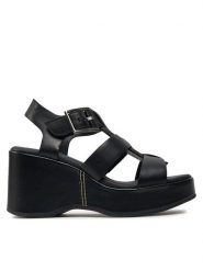 Clarks Sandały Manon Cove 26176294 Czarny. Czarne sandały Clarks, bez wzorów, ze skóry, bez obcasa, na koturnie, bez zapięcia. Za 399.99 zł.