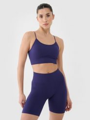 4F Biustonosz treningowy bezszwowy z niskim wsparciem damski - granatowy M/L. Niebieskie biustonosze sportowe 4f, bez wzorów, z dzianiny, na fitness i siłownię. W wyprzedaży za 79.99 zł.