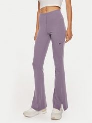 Nike Spodnie materiałowe FQ2113 Fioletowy Slim Fit. Fioletowe spodnie materiałowe Nike, bez wzorów, z materiału. Za 229.99 zł.