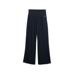 Damskie spodnie plażowe Superdry. Niebieskie spodnie sportowe Superdry, na lato, bez wzorów, długie. Za 325.15 zł.