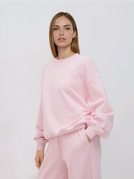 Gładka bluza z bawełną - pastelowy róż. Czerwone bluzy Reserved, l, bez wzorów, z bawełny, bez ramiączek, bez kaptura. Za 89.99 zł.