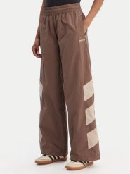 Adidas Spodnie dresowe Blocked Washed KD8790 Brązowy Loose Fit. Brązowe spodnie dresowe adidas, bez wzorów, z dresówki. Za 349.99 zł.