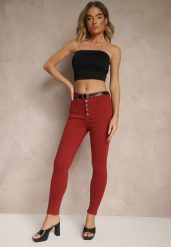 Bordowe Spodnie Skinny Winvienne. Czerwone jeansy Renee, l, w ażurowe wzory, z jeansu, z podwyższonym stanem, długie. W wyprzedaży za 63.99 zł.
