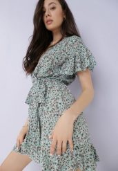 Niebieska Sukienka Asteriope. Niebieskie sukienki Born2be, m, z aplikacjami, eleganckie, bez kołnierzyka, bez ramiączek, mini, kopertowe. Za 209.99 zł.