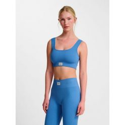 Bezszwowy biustonosz dla kobiet Hummel Pulse. Niebieskie biustonosze sportowe Hummel, bez wzorów, prążkowane, na fitness i siłownię. Za 157.50 zł.
