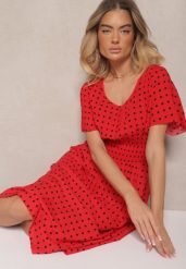 Czerwona Bawełniana Sukienka o Rozkloszowanym Fasonie w Kropki Tolimirae. Czerwone sukienki Renee, na co dzień, l, z aplikacjami, z bawełny, bez kołnierzyka, bez ramiączek, midi, rozkloszowane. Za 49.99 zł.