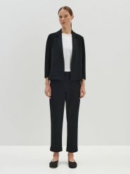 Someday Spodnie "Charlie" w kolorze czarnym rozmiar: 34. Czarne spodnie materiałowe someday., bez wzorów, z materiału, z podwyższonym stanem. Za 172.89 zł.