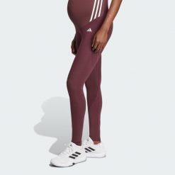 Legginsy Optime Essentials Full-Length (Maternity). Brązowe legginsy adidas, bez wzorów, z materiału. W wyprzedaży za 175.25 zł.