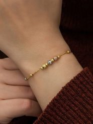 Lodie Silver Pozłacana bransoletka z elementami ozdobnymi rozmiar: onesize. Szare bransoletki Lodie Silver, pozłacane. Za 78.99 zł.