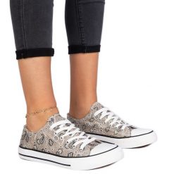 Brązowe trampki damskie materiałowe w azteckim stylu. Brązowe trampki bez wzorów, z materiału, eleganckie, bez zapięcia. Za 82.56 zł.
