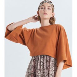 Krótka bluza z szerokimi rękawami - Brązowy. Bluzy Cropp. W wyprzedaży za 19.99 zł.