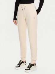 Guess Spodnie dresowe V3BB27 KBXI2 Beżowy Regular Fit. Brązowe spodnie dresowe Guess, z aplikacjami, z dresówki. Za 209.99 zł.