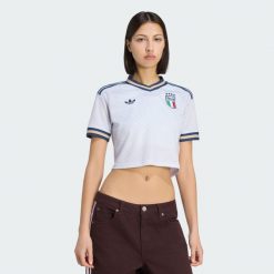 Koszulka wyjazdowa o skróconym fasonie Włochy 26. Niebieskie t-shirty sportowe adidas, xs, bez wzorów, z materiału, bez ramiączek, do piłki nożnej, climacool (adidas). Za 369.00 zł.