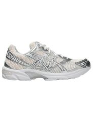 Damskie tenisówki Asics. Białe trampki ASICS, bez wzorów, z materiału, bez zapięcia. Za 474.55 zł.