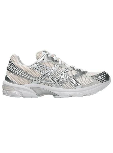 Damskie tenisówki Asics. Białe trampki ASICS, bez wzorów, z materiału, bez zapięcia. Za 474.55 zł.