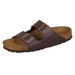 Klapki damskie Birkenstock Arizona Dunkelbraun Birkoflor. Brązowe klapki Birkenstock, bez wzorów, z materiału, sportowe, bez obcasa, bez zapięcia. Za 349.00 zł.