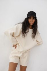 Bluza o kroju regular fit z dzianiny WAFLOWEJ w kolorze BRIGHT BEIGE - CODY. Brązowe bluzy Marsala, na lato, uniwersalny, bez wzorów, z bawełny, bez ramiączek, bez kaptura. Za 249.90 zł.