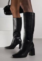 Czarne Eleganckie Kozaki VICES do Kolana ze Skóry Naturalnej na Słupku Reivela. Czarne kozaki Born2be, bez wzorów, z jeansu, biznesowe, bez obcasa, na obcasie, bez zapięcia. Za 299.99 zł.
